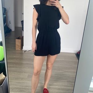 Aritzia Wilfred ruffled romper with open back